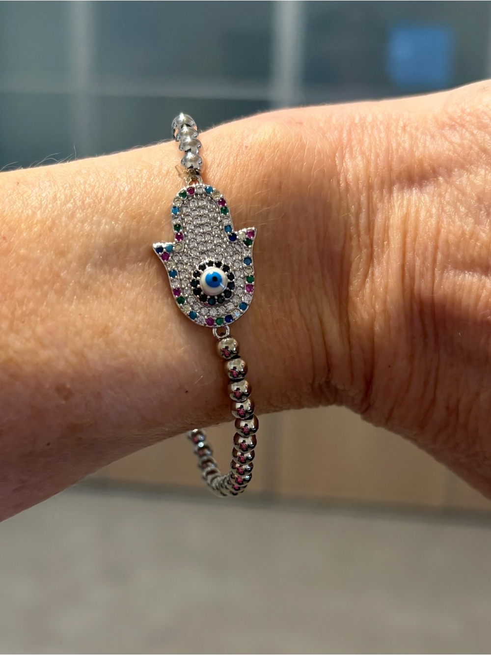Silver Hamsa Hand Bracelet with Multicolor Stones and Blue Evil Eye